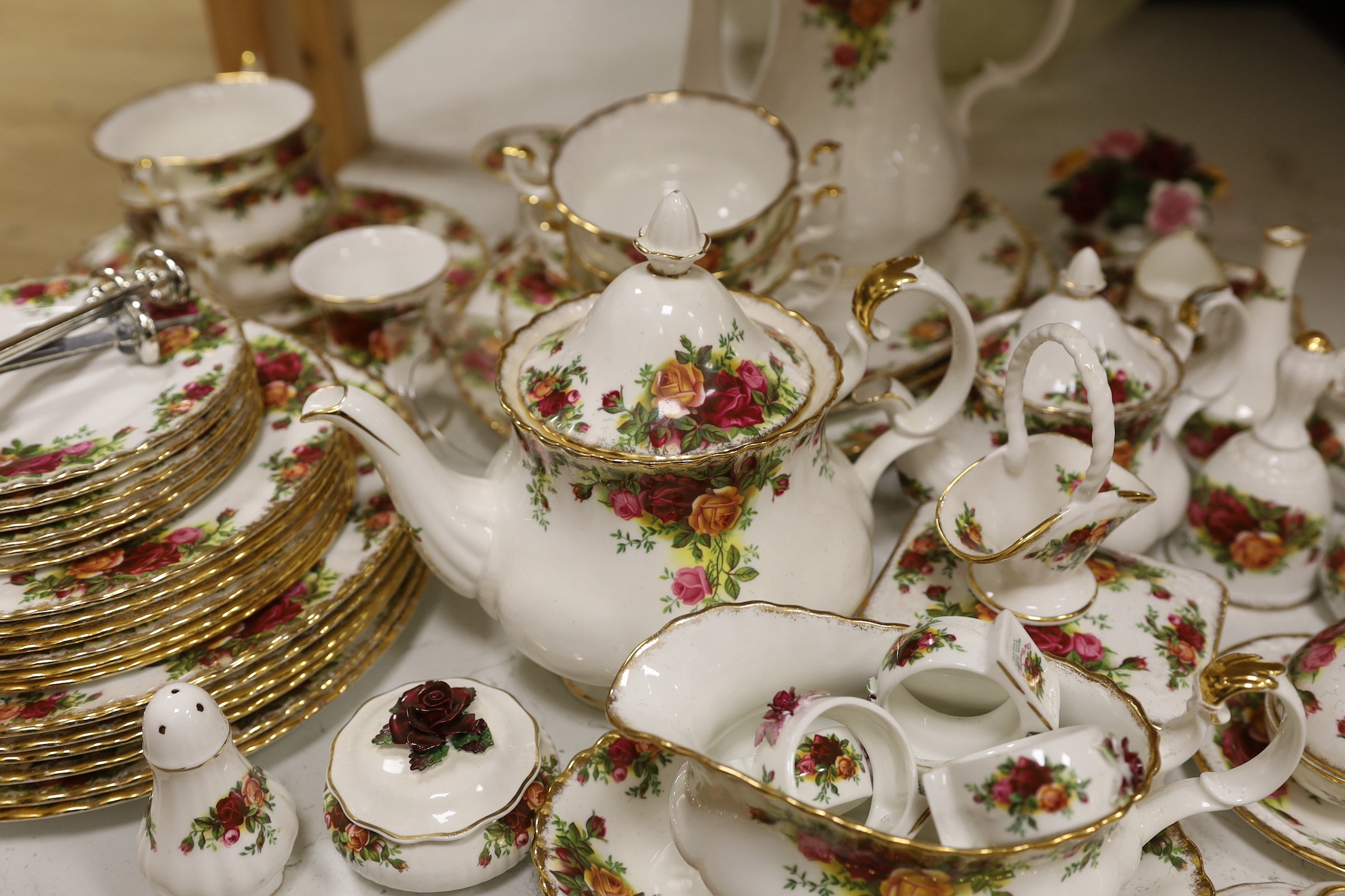 A collection of Royal Albert Old Country Roses tea and dinner service including a collection of vases, pots etc